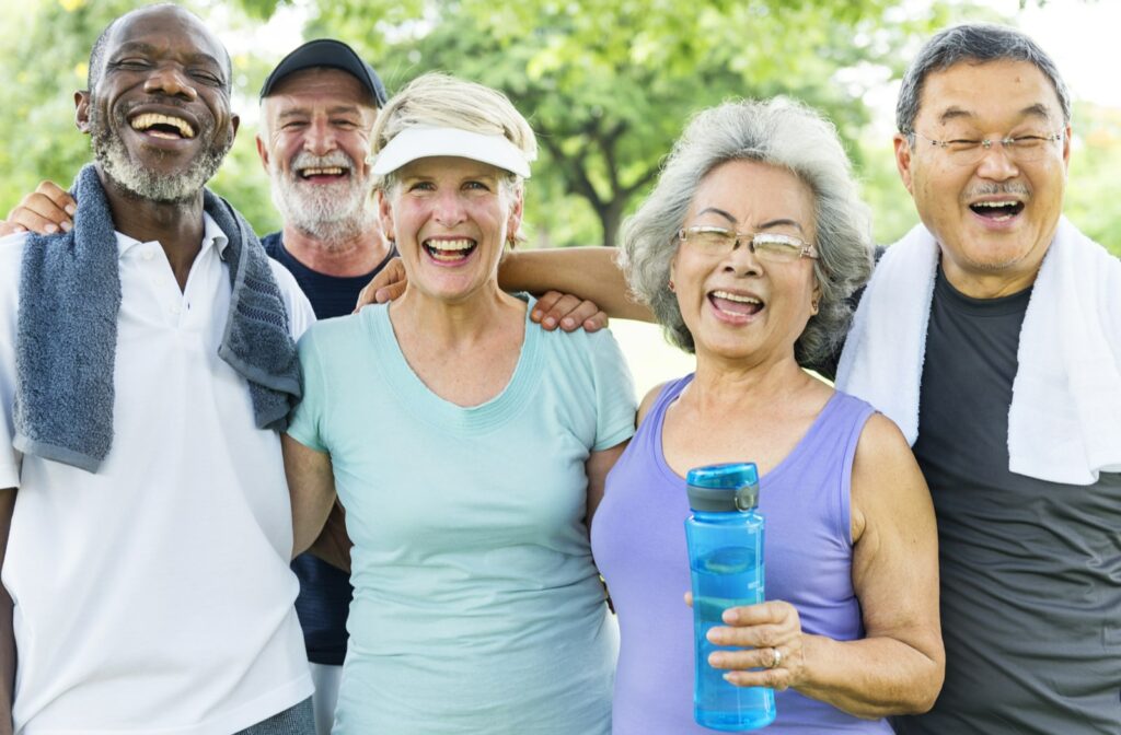 A group of seniors part of a community smiling and laughing