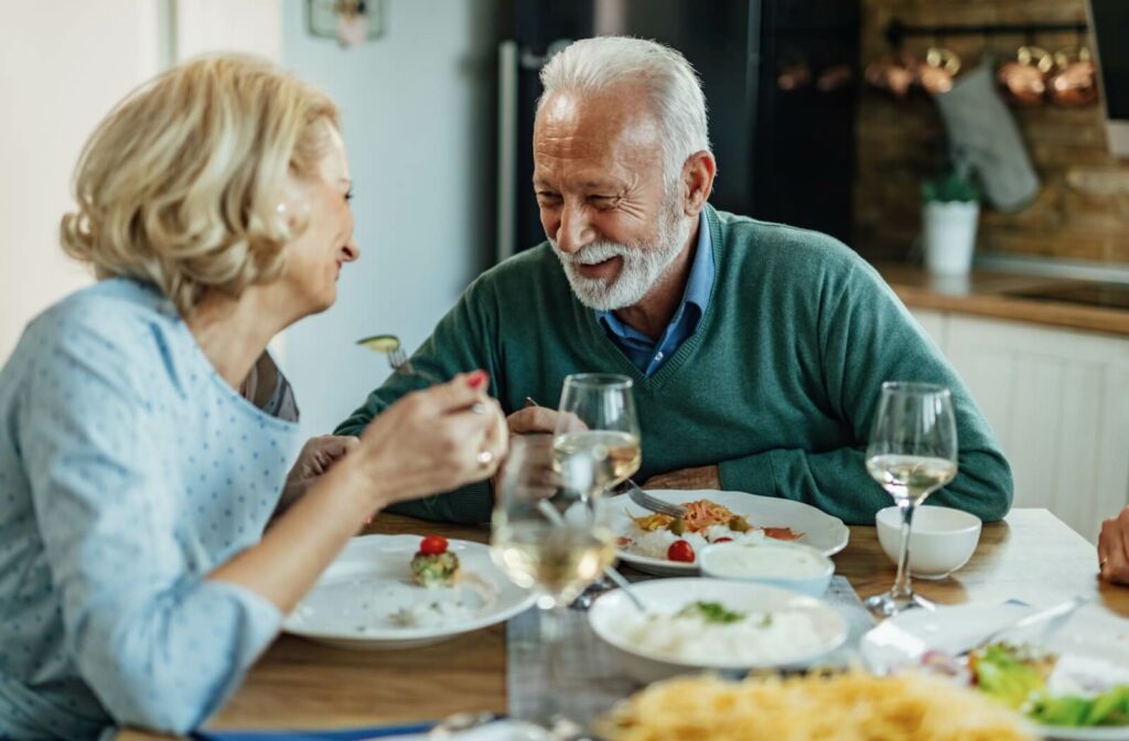two seniors enjoying their dinner in independent living